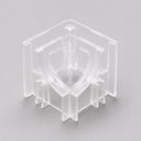 Angled view of the clear corner piece showing its cross-shaped ribs and open channel sides