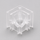 Angled view of the clear corner piece showing its cross-shaped ribs and open channel sides