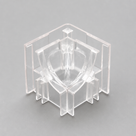Clear moulded corner piece with curved shield-shaped centre and flat side plates, grey background
