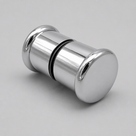 Angled studio view of the wide chrome shower knob, flared discs at each end and central black O-ring