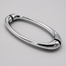 Oval chrome shower door handle on pale grey, top-lit to show the rounded tubular profile