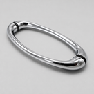 Polished chrome oval ring shower handle on pale grey, black seals where the ends meet the fixings
