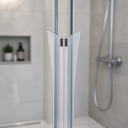 Flared clear seal fitted at shower door edge, alcove and chrome fittings behind