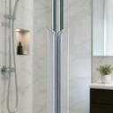 Clear seal fitted vertically between glass panels, dark magnet strip, alcove plant behind