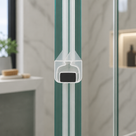 Two white magnetic seals meeting on green-edged glass door edges, black magnet visible, marble wall behind