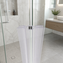 Blue-trimmed clear seal fitted at glass door join, alcove bottle and shower head behind
