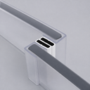 Black seal pair meeting at an angled glass join, blue trim and magnet blocks visible