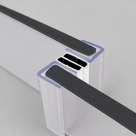 Two clear seal profiles closing at an angle, black magnet strips inside, studio shot on grey