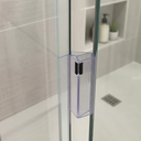 Clear seal fitted at glass door join, chrome shower hose and marble alcove behind
