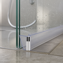 Clear seal fitted at glass shower corner on wet tiled floor, water droplets visible