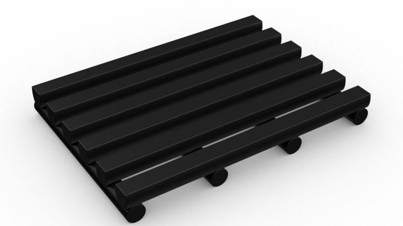 Modular black matting section for animal cages, designed as HVD Cushioned Animal Cage Matting. The elevated, slatted design ensures hygiene, promotes drainage, and offers a comfortable resting surface.