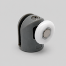 Grey plastic shower door roller, single white nylon wheel, three-quarter studio view on pale grey