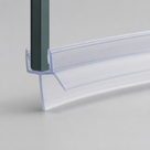 Clear pre-curved seal on grey gripping a green glass sample, broad blade curving away from the channel