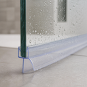 Pre-curved seal fitted to a glass door edge on a tiled shower floor, mirror visible behind