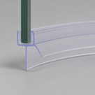 Clear pre-curved seal on a green glass sample, steeper view showing the blade sweeping round the curve