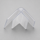 Clear 90-degree corner seal cut piece at a three-quarter angle on grey, two glass channels forming a V