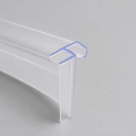 Long clear corner seal lying on grey, its near end tinted blue to show two channels meeting at a right angle