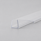 Clear U-channel seal alone on grey, flat side fin running off one wall, cut end towards the camera