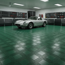 Dark green open-grid interlocking floor tiles in a garage, silver classic sports car parked on them