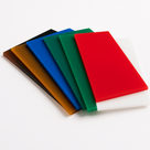 Gloss acrylic sheets fanned on white in bronze, black, amber, blue, two greens, red and white
