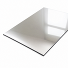 Silver acrylic mirror sheet angled on white, dark backing visible along the cut edge