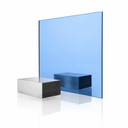 Blue tinted acrylic sheet standing upright on white, a metal block visible through it