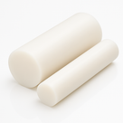 Two off-white acetal rods, one thick and one slim, side by side on a white background