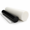 Group of acetal rods in natural cream, black and white, various diameters, end faces on a white background