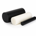 Large black acetal billet with a white billet and a slim black rod grouped on white