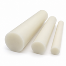 Three tapering cream nylon rods fanned out on a white background, round cut ends forward