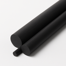 Two black rods with a much thinner rod alongside, cut ends forward on a white studio background