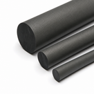 Three textured dark grey nylon rods in stepped diameters on white, grainy surface finish