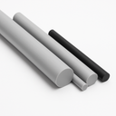 Four PVC rods angled across white, three grey in varying diameters and one black, cut ends towards the camera