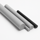 Four PVC rods angled across white, three grey in varying diameters and one black, cut ends towards the camera