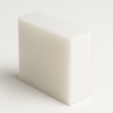 Thick off-white polypropylene block standing on edge on white, smooth satin faces and softly rounded corners