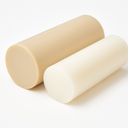 Two short polypropylene rod offcuts lying on white, one beige and one off-white, cut ends to camera