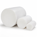 Three white PTFE billets in descending diameter grouped on a plain white background
