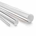 Four clear acrylic rods of increasing diameter laid side by side on white, cut ends facing forward