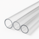 Three clear acrylic tubes nested by size on a white ground, grey cut rims stepping down to the right