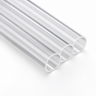 Three clear acrylic tubes lying parallel and receding, cut ends towards the camera, on white.