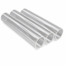 Three clear acrylic tubes lying side by side at an angle, cut ends towards the camera, on a white background.