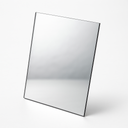 Square polycarbonate mirror sheet standing upright on white, reflective face and a thin dark edge