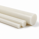 Four off-white nylon 66 bars laid parallel on white, stepped diameters with ends to the right