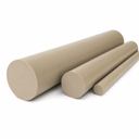 Three matt tan PEEK rods of decreasing diameter laid on white, round cut ends to the left