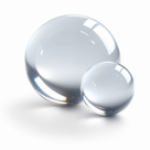 Two solid clear acrylic spheres on white, one large and one small, highlights curving across their polished surfaces