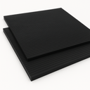 Two black fine ribbed rubber mat squares stacked at an angle on white, close parallel ribs across the top
