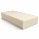 Cream nylon block on white, a deep rectangular offcut with smooth sawn faces