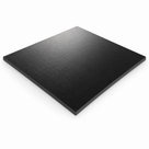 Square black acetal sheet angled on white, fine brushed grain across the face and a crisp square-cut edge