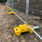 Lightweight Ballast Block with Carry Handles for Temporary Fencing