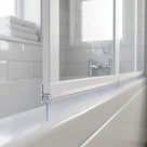 Clear bubble-bead seal with 18mm body sealing a 13-18mm gap under a folding bath screen